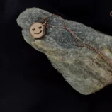 Naszyjnik aromaterapeutyczny z buźką i olejkiem na wyciszenie.